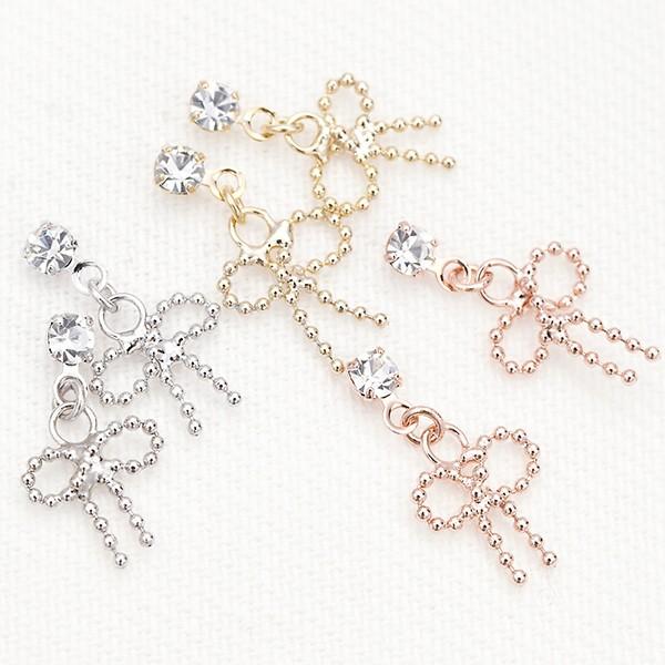 低アレルギーピアス リボンモチーフスタッドピアス チタン製ポスト キュート レディース ミル打ち ミ...