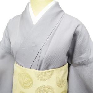 好評継続中！ 深いグリーンに虹色の四角形が織られた大島紬の 【公式