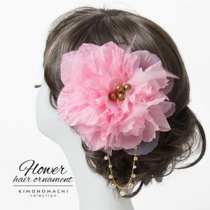 髪飾り「ピンク色 お花と羽根、チェーン飾り付き」