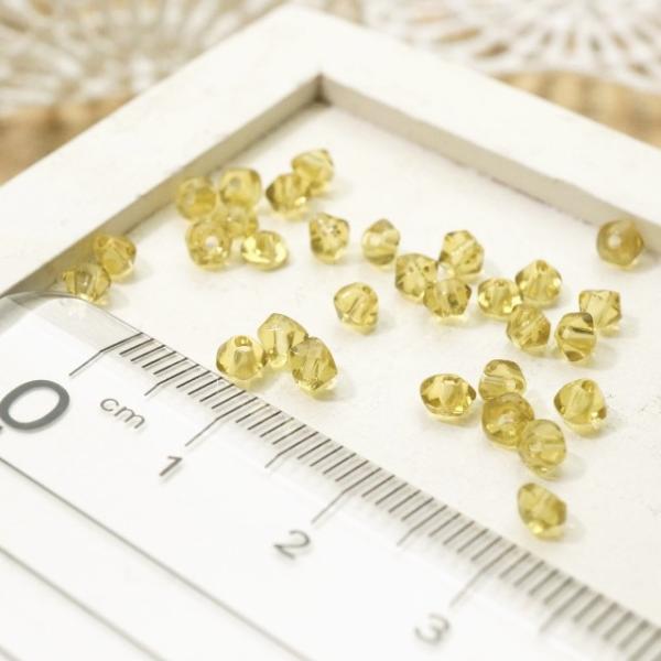 ガラスカットビーズ ソロバン系の形 直径3.4mm オリーブ 3gのグラム販売(約80個入り) グリ...