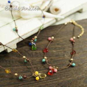 マルチカラーの丸いカラフルビーズが可愛らしい ボタンタイプのビーズ