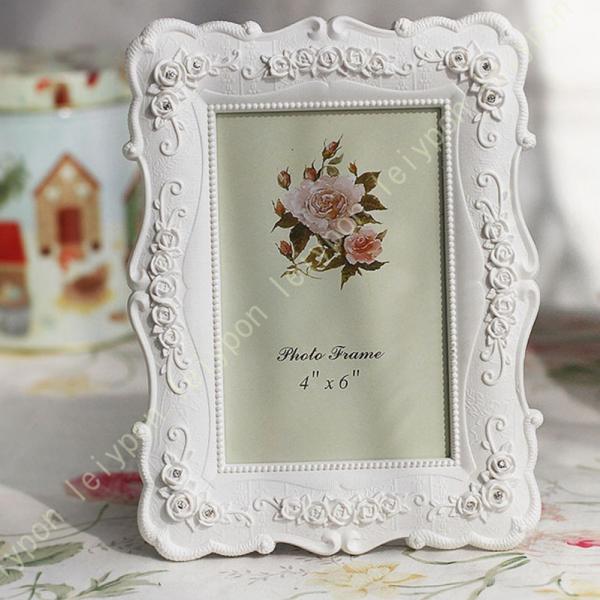 薔薇のエンボス ブーケが華やか 上品アイボリーの写真立て 写真立て 薔薇のブーケ フォトフレーム ア...
