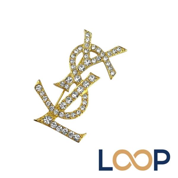 サンローラン ■新同■ カサンドラ ロゴ ブローチ アクセサリー ラインストーン ゴールド GP 【...