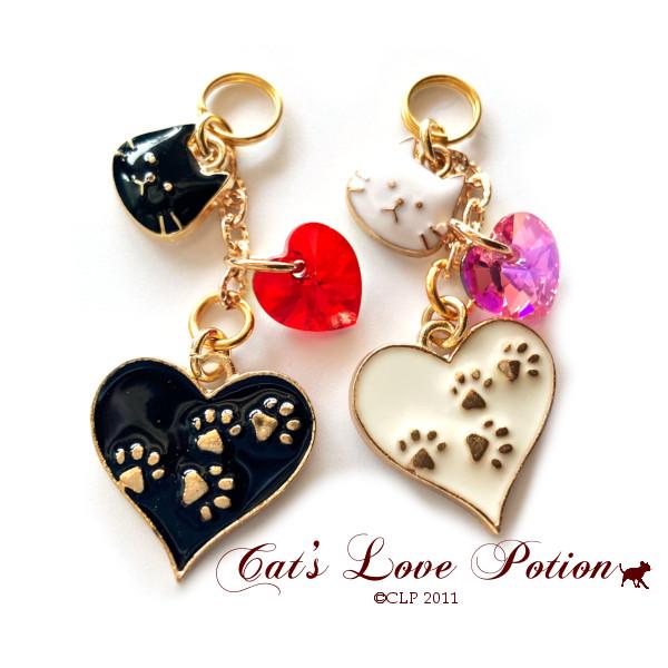 猫 イヤホンジャック スワロフスキー ハート ハート ねこ ストラップ iphone コネクタカバー...