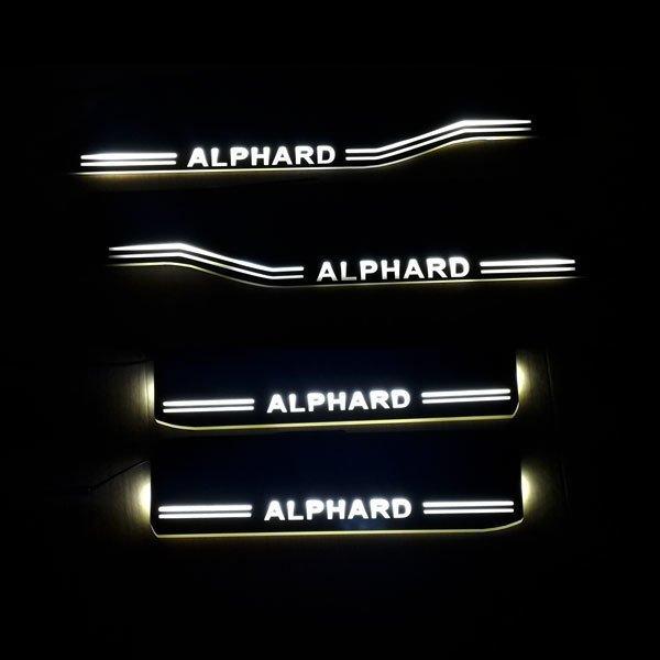 アルファード30系流れるLEDスカッフプレート白ホワイト発光 シーケンシャル ブラック 鏡面仕上げ ...