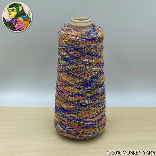 カルモアS140絣 551(毛混のブークレを絣染めした糸) 約100グラム