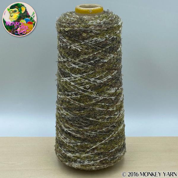 カルモアS140絣 544(毛混のブークレを絣染めした糸)