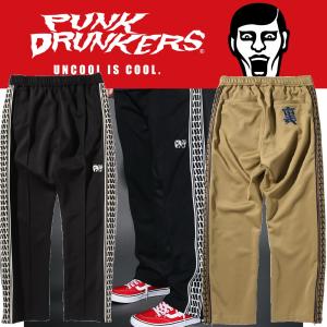 PUNK DRUNKERS（パンクドランカーズ） プリントいっぱいチノパン