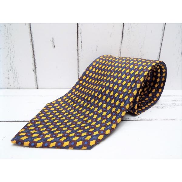 【イタリア製の上品なデザインが◎】Luciano（ルチアーノ）パターン柄オレンジネイビー系ネクタイ｜...