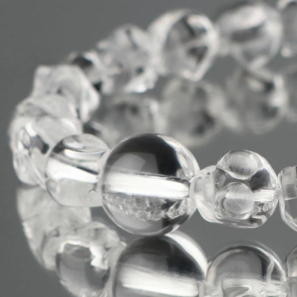 数珠ブレスレット 約9ミリ 髑髏彫り 本水晶 高級桐箱