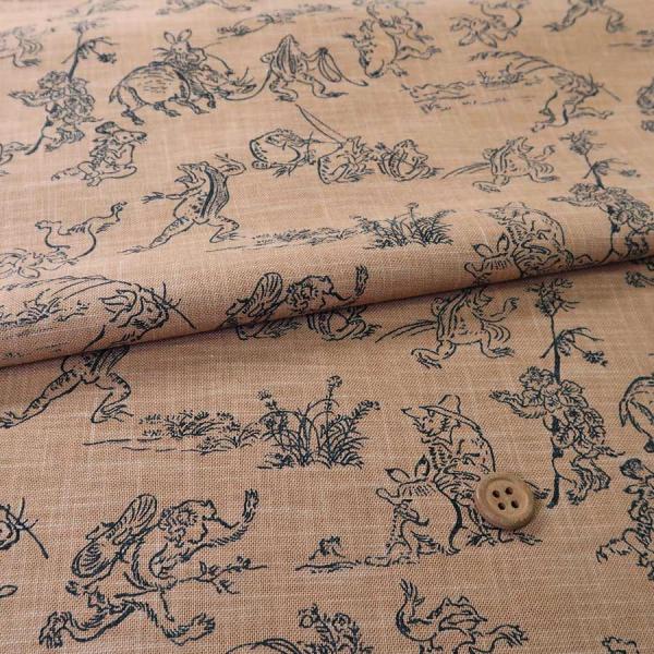 和柄コットン生地・鳥獣人物戯画(きゃら色) 10cm単位 切り売り