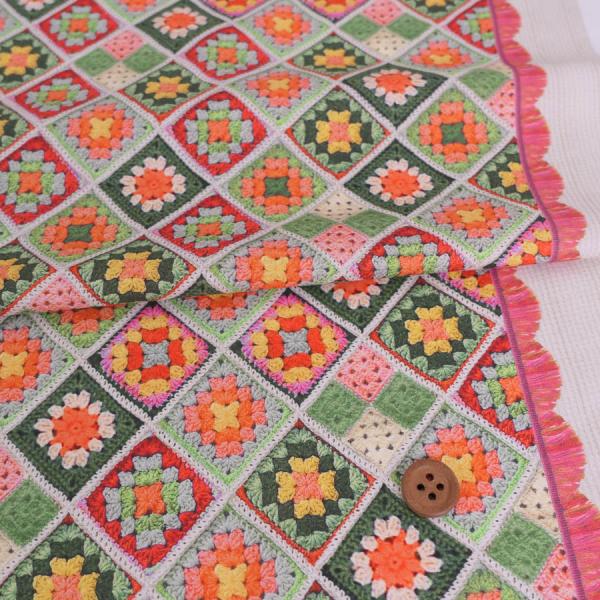 コットン生地 かぎ針編みのモチーフ柄(グリーンオレンジ) 10cm単位 切り売り