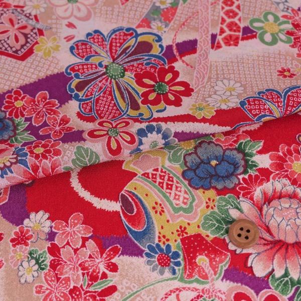 一越ちりめん・しぼりに花のし小槌文様(赤) 10cm単位 切り売り