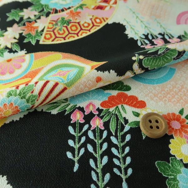 一越ちりめん かのこ雲に百花扇柄(黒) 10cm単位 切り売り