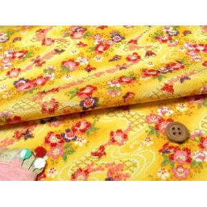 ちりめん生地・らせん流水に花と蝶(黄色) 10cm単位 切り売り