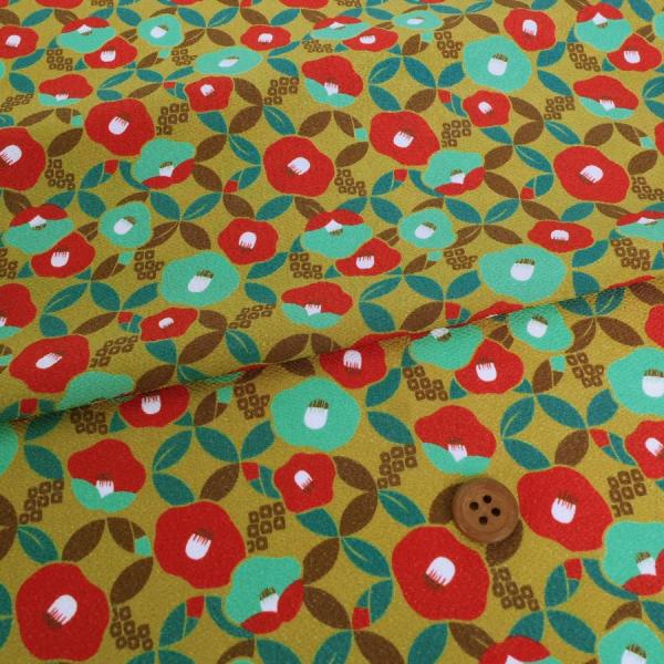 ポリちりめん生地 椿七宝(からし色) 10cm単位 切り売り