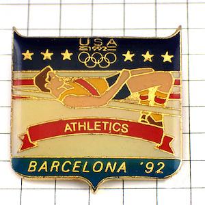 ピンバッジ・高飛び陸上選手バルセロナ五輪/USAアメリカチーム国旗スター星条旗 BARCELONA-1992 SPAIN ATHLETICS USA◆フランス限定ピンズ
