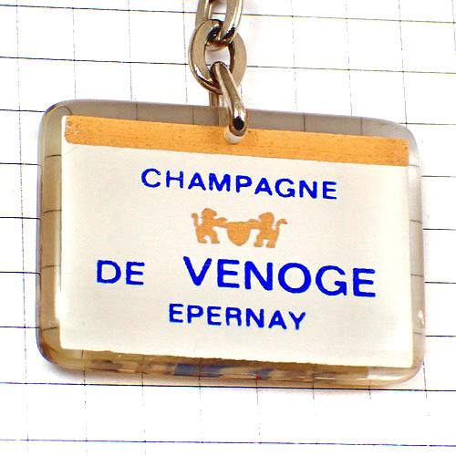 キーホルダー・シャンパーニュ壜ドゥヴノージュ葡萄酒ライオン紋章ブルボン社製 CHAMPAGNE-DE...