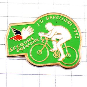 ピンバッジ・自転車バルセロナ五輪オリンピック助け合いの手 BARCELONA-1992 SPAIN SECOURS-POPULAIRE◆フランス限定ピンズ