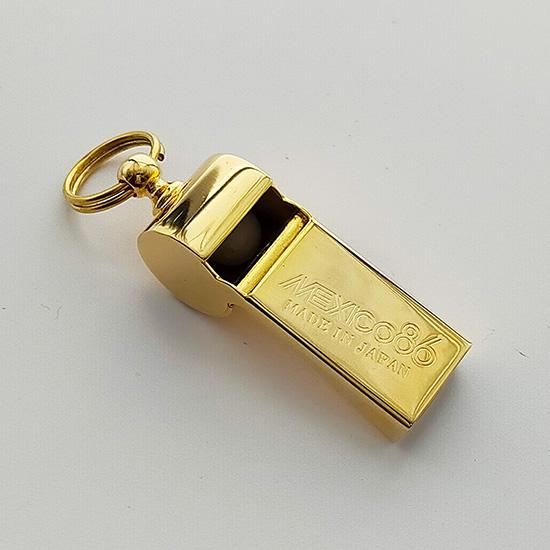 【野田鶴声社ホイッスル】ワールドカップ86年メキシコ大会モデル（ゴールド色）