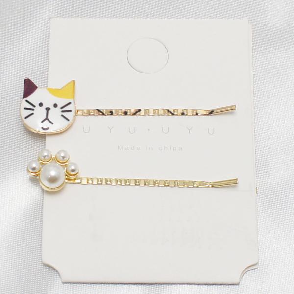 ヘアピン 三毛猫パンチなヘアピン達 Calico cat punch hairpins.