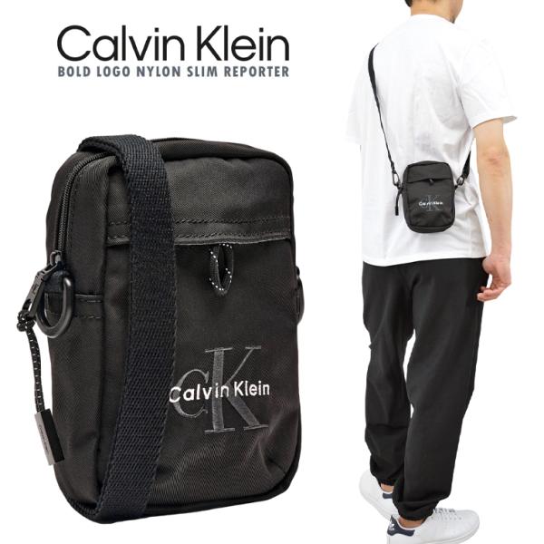 Calvin Klein カルバン・クライン ボールドロゴスリムレポータークロスボディバッグ 「BO...