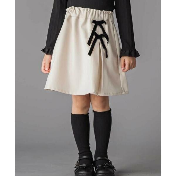 BeBe Petits Pois Vert / ベベ プチ ポワ ヴェール ラップスカート風リボンキ...