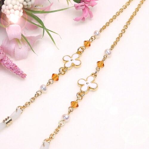 メール便 メガネチェーン ホワイトフラワー ＆ オレンジ スワロフスキー ＆ パール 眼鏡チェーン ...