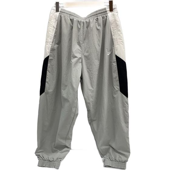 NIKE◆オーバーサイズドウーブントラックパンツ/XL/ナイロン/GRY/HQ6115-077
