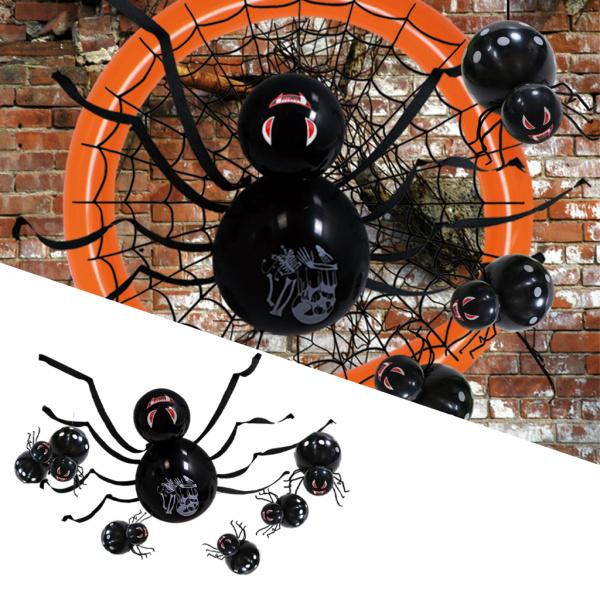 リボンの装飾が施されたクモのハロウィーンの風船ホリデー仮面舞踏会の背景黒