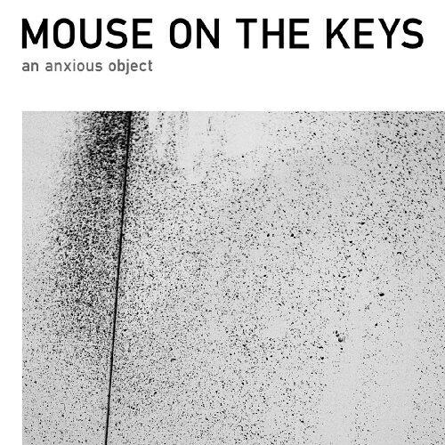 CD/mouse on the keys/an anxious object