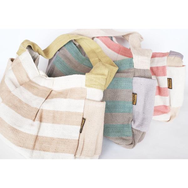 【SALE　再値下げ】サナ・ハスタカラ　ポカラバッグ　草木染めラウンドバッグ （フェアトレード商品）...