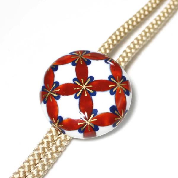 有田焼伊万里焼で知られる陶芸磁器ループタイ。染錦七宝紋様。