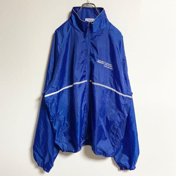 古着 used　長袖ジップアップナイロンジャケット　ワンポイント刺繍　企業ロゴ　青　ブルー　ビッグシ...