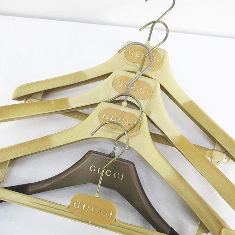 グッチ GUCCI ハンガー パンツハンガー 5本セット 形違い ベージュ系 ロゴ 文字 小物 その...