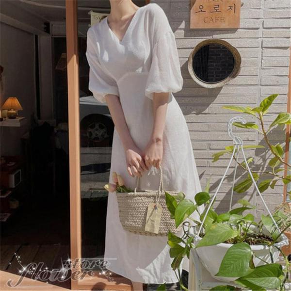 ワンピース Vネック フレア ひらひら かわいい 上品 ホワイト 上品に 女性らしくフリル揺れる 裾...