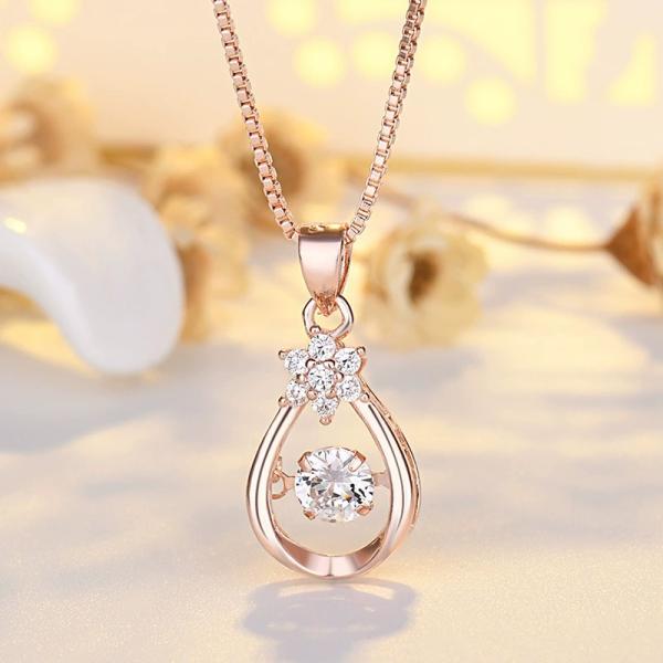 ネックレス レディース しずく 雫 揺れるダイヤ 踊る石 可愛い ピンクゴールド 女性  彼女 嫁 ...