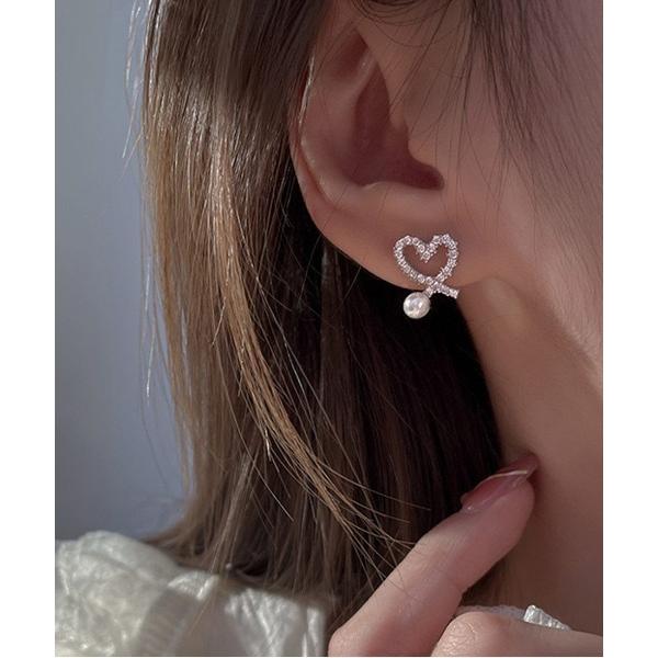 ピアス 洗練されたパール付きハートモチーフピアス レディース