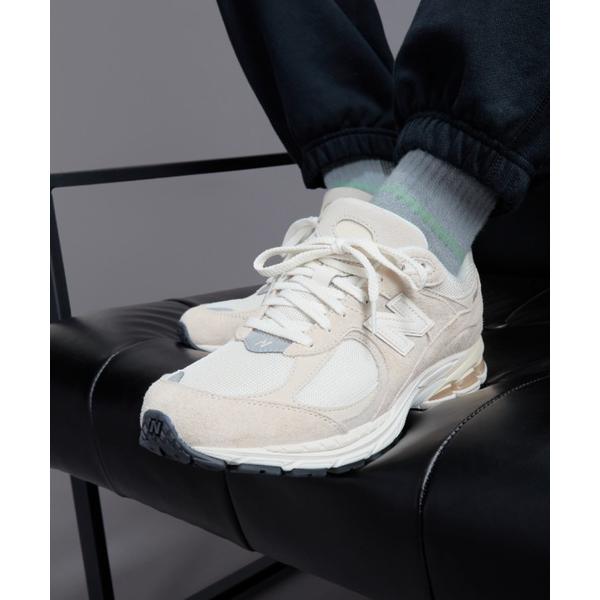 「New Balance」 ローカットスニーカー 25.5cm オフホワイト レディース