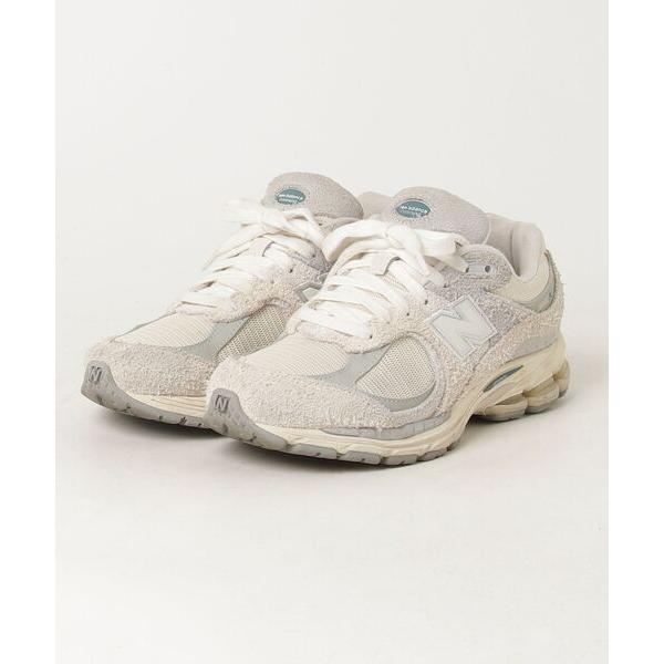 「New Balance」 ローカットスニーカー 22.5cm オフホワイト レディース