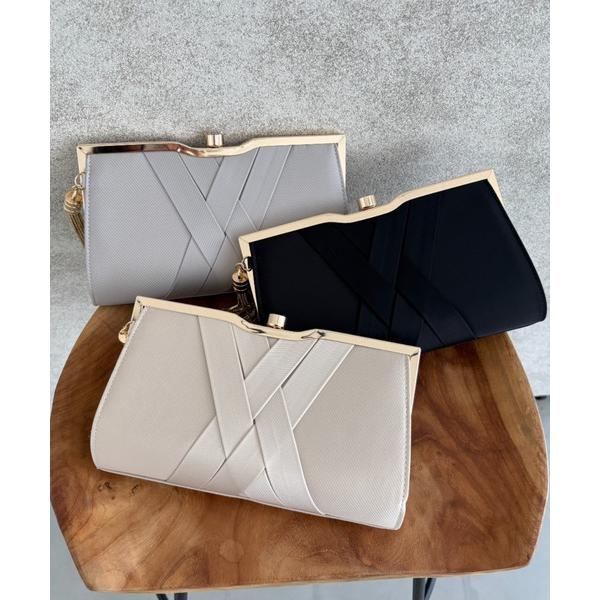 クラッチバッグ パーティーバッグ クロスマークコンパクトクラッチバック タッセル付き レディース