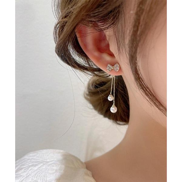 ピアス 揺れる可愛い。リボンビジュー×パールチェーンキャッチピアス レディース