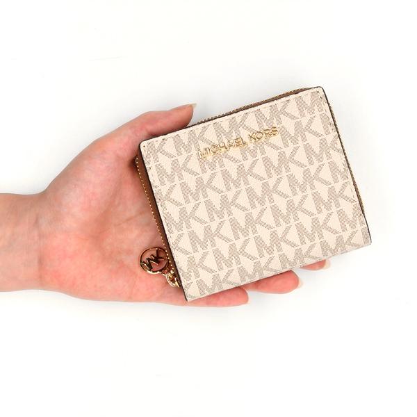 【新品未使用】MICHAEL KORS ジップチャームウォレット ピンク MICHAEL KORS（マイケルコース）の「JET SET TRAVEL ジップ チャーム