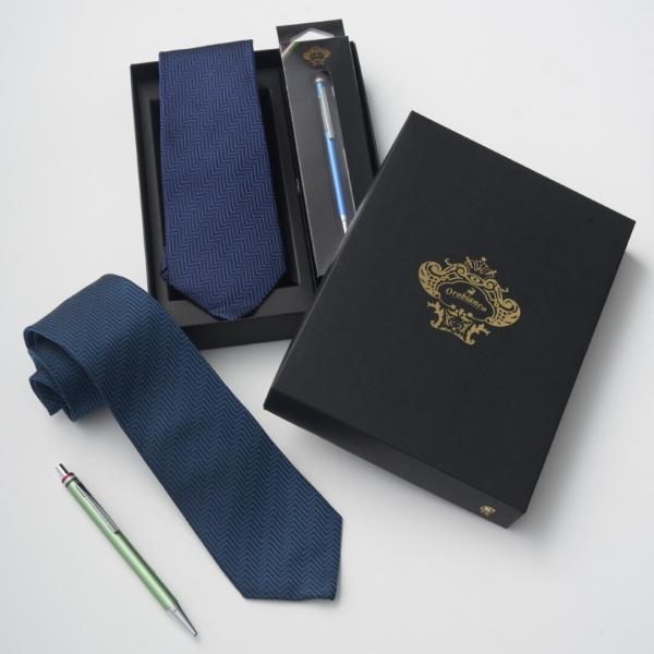 型番：107015213ブランド：オロビアンコ商品名：【ネクタイ】オロビアンコ｜ボールペンセット ヘリンボーンカラー：ネイビーブルー/ターコイズ