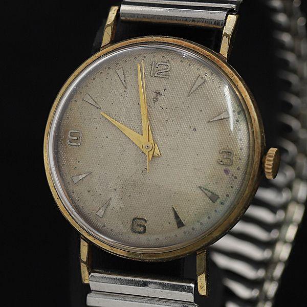 ジュベニア 手巻き アイボリー文字盤 ラウンド メンズ腕時計