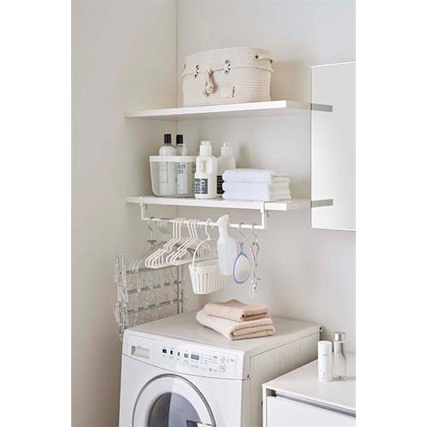 洗濯機上の棚に取り付けてスペースを有効活用！収納場所に合わせて横幅を調整できる伸縮収納ハンガー。ハンガー・ピンチハンガー・スプレー・洗濯小物などを引っかけて、まとめて一括収納。タオル・ブラシ・ドライヤーなどの洗面用品の収納にも便利。ハンガー...