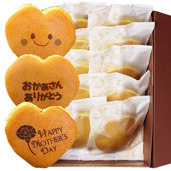 お菓子で贈る「ありがとう」のメッセージ♪母の日限定のかわいいハート型どら焼きでお母さんに感謝の気持ちをお伝えいたします。[商品名] どら焼き(小豆餡)[内容量]10個入り(おかあさんありがとう4個、HAPPY MOTHER'S DAY3個、...