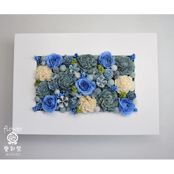 プリザーブドフラワーの壁掛け ブルーのバラ 水色のソーラーフラワー