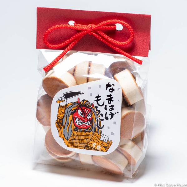 名物なまはげの面を型打ちした焼きもろこし。一口サイズのもろこしはちょっとした秋田のお土産にも最適です。■社名：（有）フジタ製菓■内容量：120g■原材料：砂糖・小豆粉