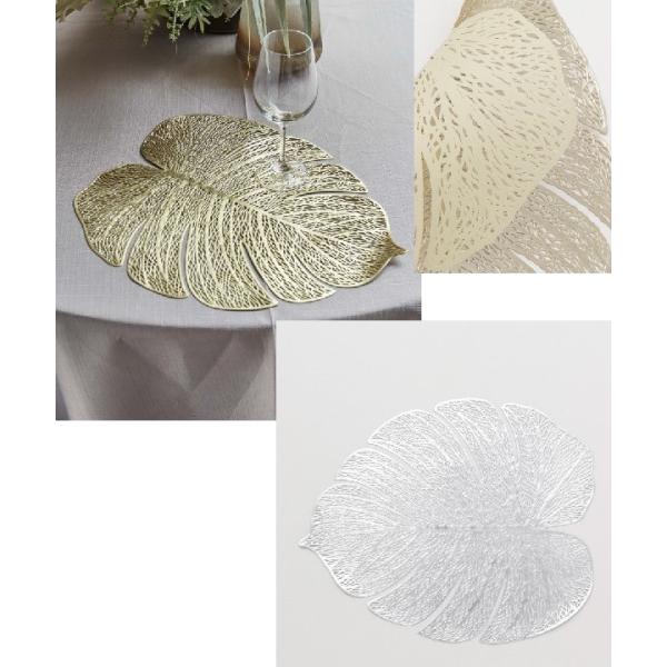 ゴールドやシルバーが上品に煌めく、ハワイアンの定番モンステラ柄のプレイスマット。食事の時はもちろん、インテリアとしてもお使いいただけます。さりげなく輝くシンプルなデザインがお部屋を上品に着飾ります。定価1,320円（税込）【素材】ポリ塩化ビ...